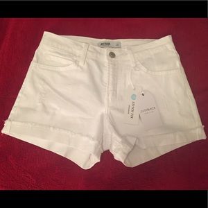 “Just Black” white shorts